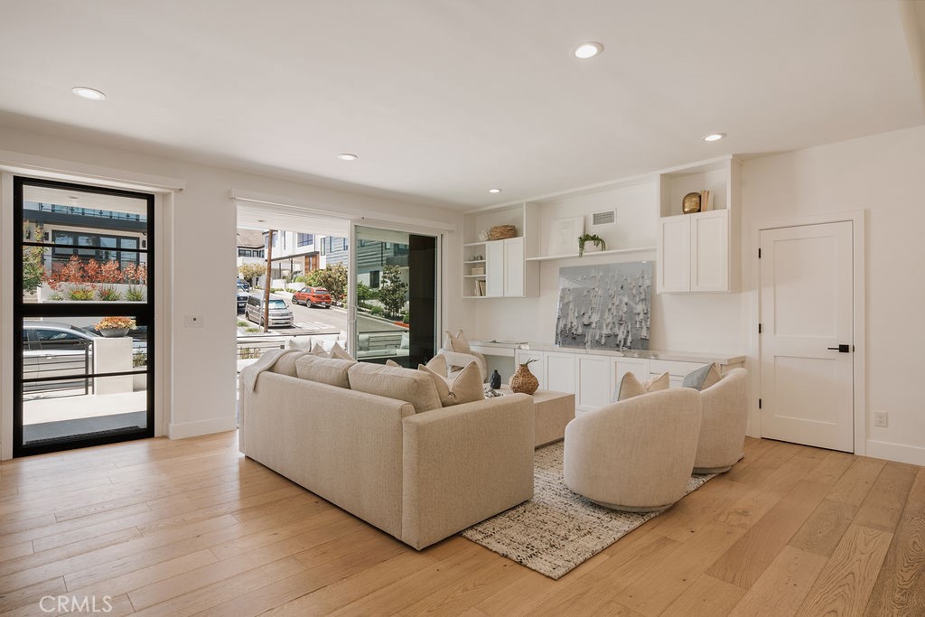 Upper living room opening to the street
